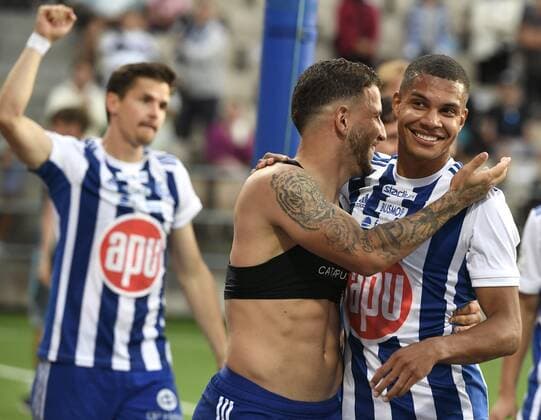 From left, HJK players Jukka Raitala, Murilo and Anthony Olusanya celebrating 1-0 voctory after the UEFA European League 3rd Qualification Round football match HJK vs Maribor in Helsinki on August 11, 2022. Helsinki Finland LKLAPJ20220811205612O642  Copyright: xJussixNukarix LKLAPJ20220811205612O642