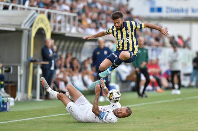 From left Michal Kadlec of Slovacko and Diego Rossi of Fenerbahce in action during the European Football League third qualifying round return match: FC Slovacko vs Fenerbahce Istanbul in Uherske Hradiste, Czech Republic, August 11, 2022. (CTKxPhoto DaliborxGluck) CTKPhotoP2022081107704  dg020