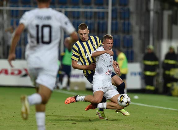 From left Attila Szalai of Fenerbahce and Ondrej Sasinka of Slovacko in action during the European Football League third qualifying round return match: FC Slovacko vs Fenerbahce Istanbul in Uherske Hradiste, Czech Republic, August 11, 2022. (CTKxPhoto DaliborxGluck) CTKPhotoP2022081107549  dg009