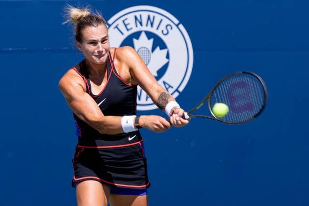 TORONTO, ON - AUGUST 11: Aryna Sabalenka returns the ball during her National Bank Open tennis tournament third round match on August 11, 2022, at Sobeys Stadium in Toronto, ON, Canada. (Photo by Julian Avram Icon Sportswire) TENNIS: AUG 11 National Bank Open Icon2208110017