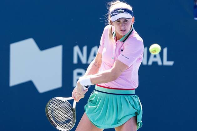 TORONTO, ON - AUGUST 11: Jil Teichmann returns the ball during her National Bank Open tennis tournament third round match on August 11, 2022, at Sobeys Stadium in Toronto, ON, Canada. (Photo by Julian Avram Icon Sportswire) TENNIS: AUG 11 National Bank Open Icon2208111095