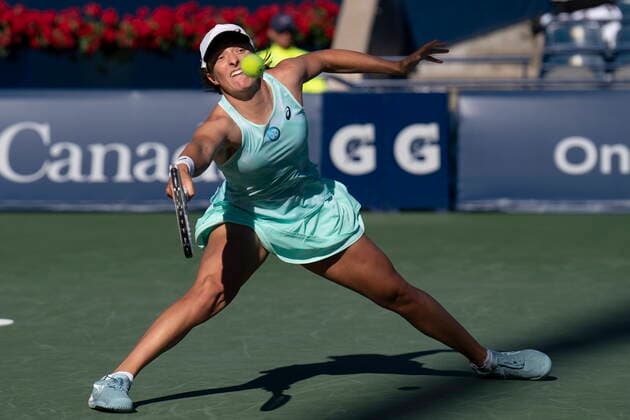 August 11, 2022, TORONTO, ON, CAN: Iga Swiatek reaches for a shot during her defeat to Beatriz Haddad Maia in National Bank Open tennis action in Toronto, Thursday, August 11, 2022. Canada News - August 11, 2022  - ZUMAc35_ 20220811_zaf_c35_172 Copyright: xChrisxYoungx