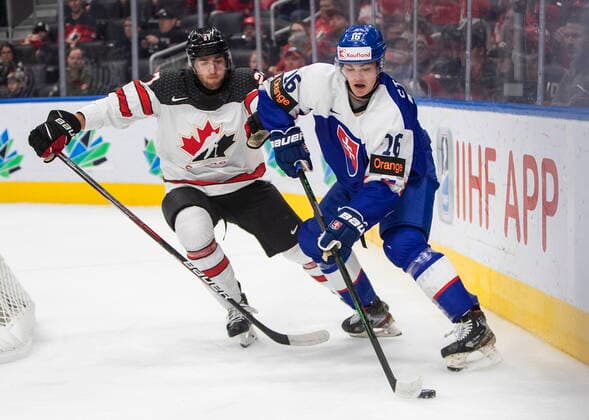 August 11, 2022, EDMONTON, AB, CANADA: CORRECTS TO CANADA S WILL CUYLLE -- Canada s Will Cuylle (27) and Slovakia s Oliver Stumpel (16) battle for the puck during first period IIHF World Junior Hockey Championship action in Edmonton on Thursday August 11, 2022. Canada News - August 11, 2022  - ZUMAc35_ 20220811_zaf_c35_220 Copyright: xJasonxFransonx