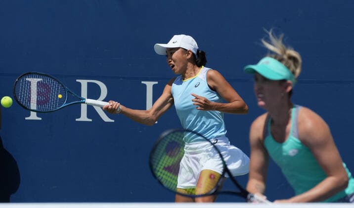 (220812) -- TORONTO, Aug. 12, 2022 -- Zhang Shuai (L) Storm Sanders comepete during the quarterfinals of women s doubles match between Zhang Shuai (China) Storm Sanders (Australia) and Nicole Melichar-Martinez (the United States) Ellen Perez (Australia) at the 2022 National Bank Open tennis tournament in Toronto, Canada, on Aug. 11, 2022. (Photo by Zou Zheng Xinhua) (SP)CANADA-TORONTO-TENNIS-NATIONAL BANK OPEN-WOMEN S DOUBLES linwei2 