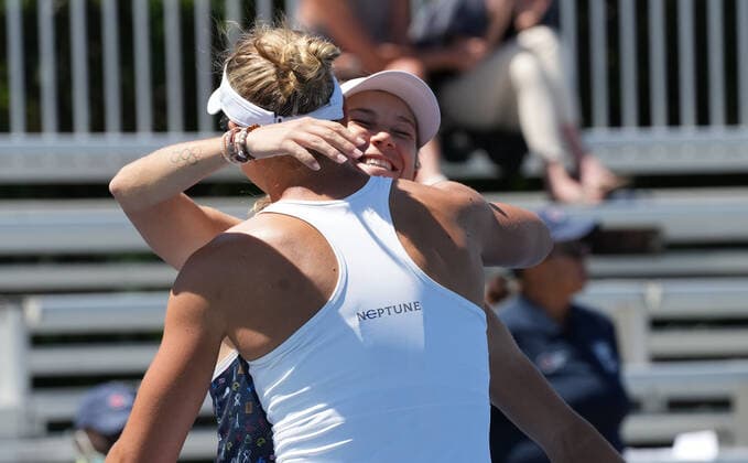 (220812) -- TORONTO, Aug. 12, 2022 -- Nicole Melichar-Martinez (Front) Ellen Perez celebrate after the quarterfinals of women s doubles match between Zhang Shuai (China) Storm Sanders (Australia) and Nicole Melichar-Martinez (the United States) Ellen Perez (Australia) at the 2022 National Bank Open tennis tournament in Toronto, Canada, on Aug. 11, 2022. (Photo by Zou Zheng Xinhua) (SP)CANADA-TORONTO-TENNIS-NATIONAL BANK OPEN-WOMEN S DOUBLES linwei2 