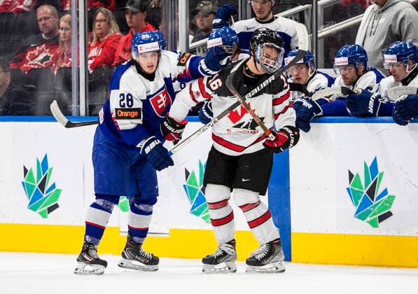 August 11, 2022, EDMONTON, AB, CANADA: Canada s Connor Bedard (16) is roughed up by Slovakia s Boris Zabka (28) during first period IIHF World Junior Hockey Championship action in Edmonton on Thursday August 11, 2022. Canada News - August 11, 2022  - ZUMAc35_ 20220811_zaf_c35_223 Copyright: xJasonxFransonx