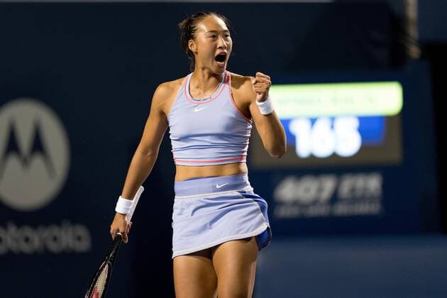 TORONTO, ON - AUGUST 11: Qinwen Zheng celebrates after winning a point during her National Bank Open tennis tournament third round match on August 11, 2022, at Sobeys Stadium in Toronto, ON, Canada. (Photo by Julian Avram Icon Sportswire) TENNIS: AUG 11 National Bank Open Icon2208112757