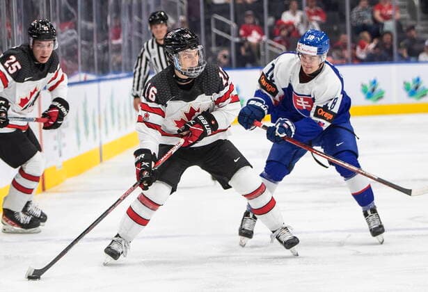 August 11, 2022, EDMONTON, AB, CANADA: Canada s Connor Bedard (16) is chased by Slovakia s Servac Petrovsky (18) during second period IIHF World Junior Hockey Championship action in Edmonton on Thursday August 11, 2022. Canada News - August 11, 2022  - ZUMAc35_ 20220811_zaf_c35_229 Copyright: xJasonxFransonx
