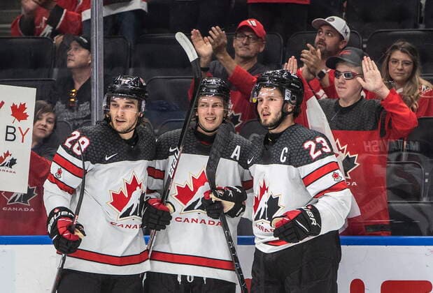 August 11, 2022, EDMONTON, AB, CANADA: Canada s Ryan O Rourke (28), Kent Johnson (13) and Mason McTavish (23) celebrate a goal against Slovakia during second period IIHF World Junior Hockey Championship action in Edmonton on Thursday August 11, 2022. Canada News - August 11, 2022  - ZUMAc35_ 20220811_zaf_c35_233 Copyright: xJasonxFransonx
