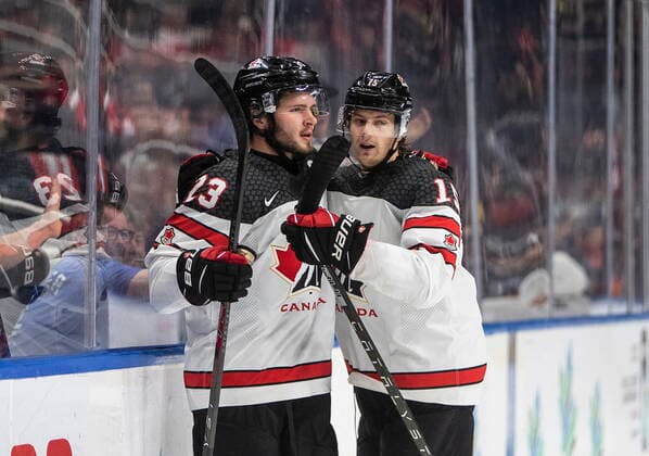 August 11, 2022, EDMONTON, AB, CANADA: Canada s Mason McTavish (23) and Brennan Othmann (15) celebrate a goal against Slovakia during second period IIHF World Junior Hockey Championship action in Edmonton on Thursday August 11, 2022. Canada News - August 11, 2022  - ZUMAc35_ 20220811_zaf_c35_238 Copyright: xJasonxFransonx