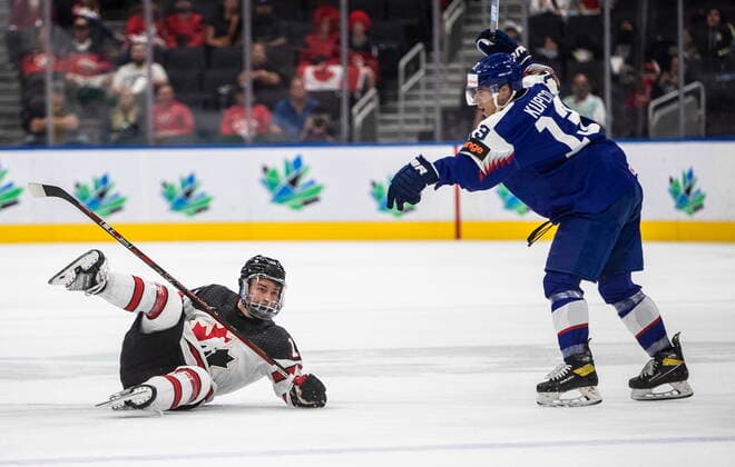 August 11, 2022, EDMONTON, AB, CANADA: Canada s Connor Bedard (16) is checked by Slovakia s Lubomir Kupco (13) during second period IIHF World Junior Hockey Championship action in Edmonton on Thursday August 11, 2022. Canada News - August 11, 2022  - ZUMAc35_ 20220811_zaf_c35_239 Copyright: xJasonxFransonx