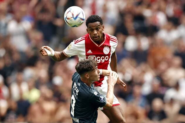 AMSTERDAM lr Jorgen Strand Larsen of FC Groningen, Jurrien Timber of Ajax during the Dutch Eredivisie match between Ajax Amsterdam and FC Groningen at the Johan Cruijff ArenA on August 14, 2022 in Amsterdam, Netherlands ANP MAURICE VAN STEEN Dutch Eredivisie 2022 2023 xVIxANPxSportx xxANPxIVx 453058355 originalFilename: 453058355.jpg