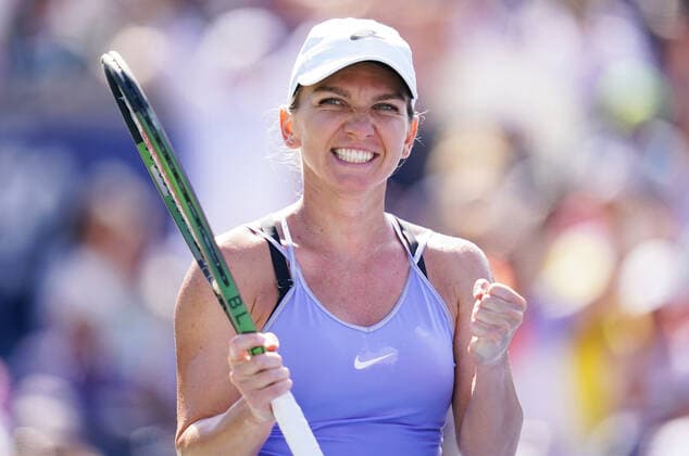 August 14, 2022, Toronto, Ontario, Canada: SIMONA HALEP from Romania celebrates after defeating Beatriz Haddad Maia 3-6, 6-2, 3-6 to win the National Bank Open in Toronto Canada. Toronto Canada - ZUMAm215 20220814_zip_m215_011 Copyright: xArlynxMcAdoreyx
