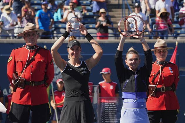 August 14, 2022, Toronto, ON, Canada: Simona Halep, of Romania, right, celebrates his win over Beatriz Haddad Maia, of Brazil, left, during National Bank Open final tennis tournament action in Toronto on Sunday, August 14, 2022. Canada News - August 14, 2022  - ZUMAc35_ 20220814_zaf_c35_068 Copyright: xNathanxDenettex