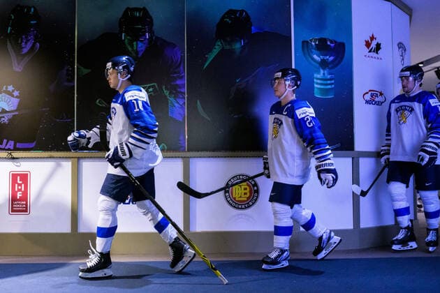 220815 Kasper Puutio and Roni Hirvonen of Finland walk to the ice for warm up during the 2022 IIHF World Junior Championship group stage game between Canada and Finland on August 15, 2022 in Edmonton Photo Joel Marklund BILDBYRAN kod JM JM0360 bbeng ishockey ice hockey jvm junior vm u20 2022 iihf world junior championship world juniors canada kanada finland,  Copyright: JOELxMARKLUND BB220815JM002