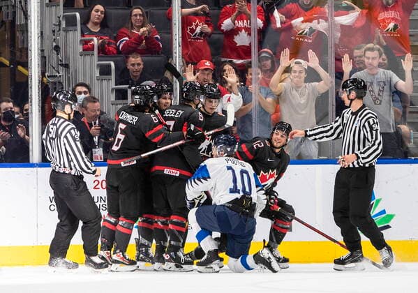 August 15, 2022, EDMONTON, AB, CANADA: Canada celebrates a goal as Finland s Kasper Puutio looks on during first period IIHF World Junior Hockey Championship action in Edmonton on Monday August 15, 2022. Canada News - August 15, 2022  - ZUMAc35_ 20220815_zaf_c35_052 Copyright: xJasonxFransonx