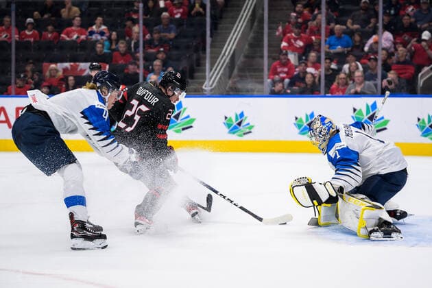 220815 Joni Jurmo and goaltender Leevi Meriläinen of Finland are being challenged by William Dufour of Canada during the 2022 IIHF World Junior Championship group stage game between Canada and Finland on August 15, 2022 in Edmonton Photo Joel Marklund BILDBYRAN kod JM JM0360 bbeng ishockey ice hockey jvm junior vm u20 2022 iihf world junior championship world juniors canada kanada finland,  Copyright: JOELxMARKLUND BB220815JM053