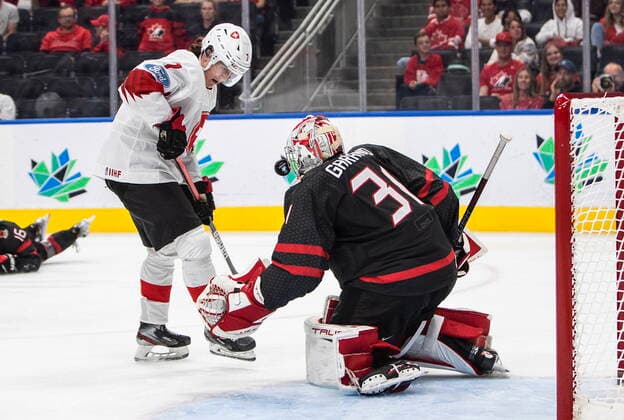 August 17, 2022, EDMONTON, AB, CANADA: Canada goalie Dylan Garand (31) makes the save on Switzerland s Joel Henry (7) during third period IIHF World Junior Hockey Championship quarterfinal action in Edmonton on Wednesday August 17, 2022. Canada News - August 17, 2022  - ZUMAc35_ 20220817_zaf_c35_120 Copyright: xJasonxFransonx