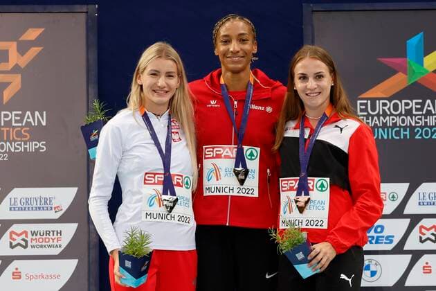 Munich, Germany - August 19 : Thiam Nafi Athletics Heptathlon (Female) of Belgium pictured during the podium ceremony with Kalin Annik of Switzerland second place and third place Adrianna SuBek of Polen during the 2022 European Championships Athletics as part of the European Championships Munich 2022 on August 19, 2022 in Munich, Germany, 19 08 2022 ( European Championship, EM, Europameisterschaft Athletics Munich 2022 PhotoNews Panoramic 
