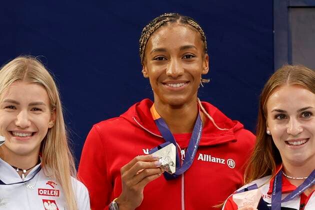 Munich, Germany - August 19 : Thiam Nafi Athletics Heptathlon (Female) of Belgium pictured during the podium ceremony with Kalin Annik of Switzerland second place and third place Adrianna SuBek of Polen during the 2022 European Championships Athletics as part of the European Championships Munich 2022 on August 19, 2022 in Munich, Germany, 19 08 2022 ( European Championship, EM, Europameisterschaft Athletics Munich 2022 PhotoNews Panoramic 