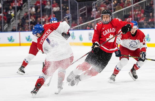 August 19, 2022, EDMONTON, AB, CANADA: Canada s Connor Bedard (16) is checked by Czechia s Jiri Tichacek (4) during second period IIHF World Junior Hockey Championship semifinal action in Edmonton on Friday August 19, 2022. Canada News - August 19, 2022  - ZUMAc35_ 20220819_zaf_c35_071 Copyright: xJasonxFransonx