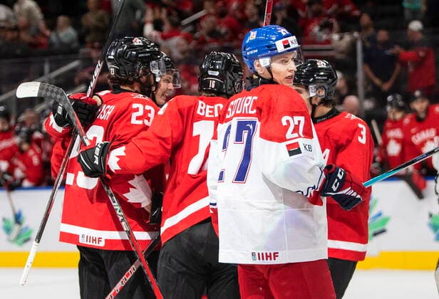August 19, 2022, EDMONTON, AB, CANADA: Canada celebrates a goal as Czechia s Gabriel Szturc (27) looks on during second period IIHF World Junior Hockey Championship semifinal action in Edmonton on Friday August 19, 2022. Canada News - August 19, 2022  - ZUMAc35_ 20220819_zaf_c35_081 Copyright: xJasonxFransonx