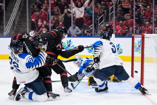 220820 Kent Johnson of Canada scores the game winning 3 2 goal in overtime behind goaltender Juha Jatkola of Finland during the 2022 IIHF World Junior Championship final between Canada and Finland on August 20, 2022 in Edmonton Photo Joel Marklund BILDBYRAN kod JM JM0370 bbeng ishockey ice hockey jvm junior vm u20 2022 iihf world junior championship world juniors final canada kanada finland,  Copyright: JOELxMARKLUND BB220820JM144