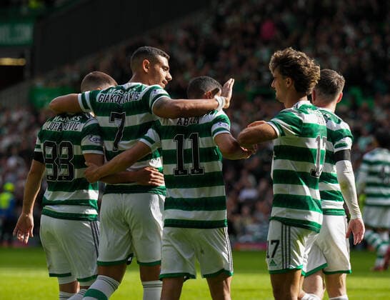 Mandatory Credit: Photo by Stuart Wallace Shutterstock (13134393av) Giorgos Giakoumakis of Celtic celebrates scoring against 9 men Hearts with team mates, after Alex Cochrane & Toby Sibbick were sent off, to give Celtic a 2-0 lead late in the game. Celtic v Hearts, Cinch Scottish Premiership, Football, Celtic Park, Glasgow, Scotland, UK - 21 Aug 2022 EDITORIAL USE ONLY No use with unauthorised audio, video, data, fixture lists, club league logos or live services. Online in-match use limited to 120 images, no video emulation. No use in betting, games or single club league player publications. Celtic v Hearts, Cinch Scottish Premiership, Football, Celtic Park, Glasgow, Scotland, UK - 21 Aug 2022 EDITORIAL USE ONLY No use with unauthorised audio, video, data, fixture lists, club league logos or live services. Online in-match use limited to 120 images, no video emulation. No use in betting, games or single club league player publications.  Copyright: xStuartxWallace Shutterstockx 13134393av