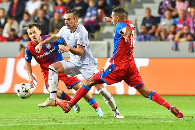 From left soccer players Pavel Bucha of Viktoria Plzen, Marko Vesovic of Qarabag and Jhon Mosquera of Plzen in action during the return match of football Champions League qualifier fourth round Viktoria Plzen vs FK Qarabag in Pilsen, Czech Republic, August 23, 2022. (CTKxPhoto MiroslavxChaloupka) CTKPhotoP2022082307998  cha012
