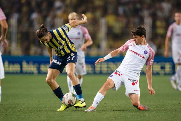 SOCCER - UEFA EL, Fenerbahce vs A.Wien ISTANBUL,TURKEY,25.AUG.22 - SOCCER - UEFA Europa League, play off, Fenerbahce Istanbul vs FK Austria Wien. Image shows Miguel Crespo (Fenerbahce) and Dominik Fitz (A.Wien).  GEPAxpictures xJohannesxFriedl