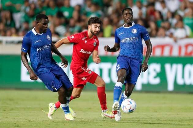 NICOSIA, CYPRUS - AUGUST 25 : Okumu Joseph defender of KAA Gent and Ngadeu Michael defender of KAA Gent during the UEFA Europa Conference league Fourth Qualifying Round match second leg between Omonia Nicosia and Kaa Gent on august 25, 2022 in Nicosia, Cyprus, 25 08 2022 ( Omonia Nicosia v Kaa Gent - Conference League PhotoNews Panoramic 