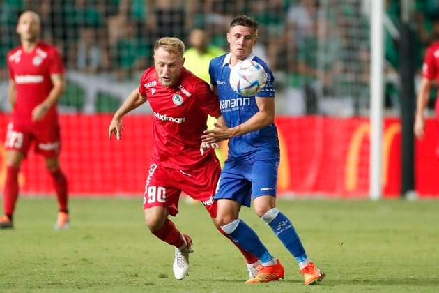 NICOSIA, CYPRUS - AUGUST 25 : Bezus Roman forward of Omonia and Castro-Montes Alessio midfielder of KAA Gent during the UEFA Europa Conference league Fourth Qualifying Round match second leg between Omonia Nicosia and Kaa Gent on august 25, 2022 in Nicosia, Cyprus, 25 08 2022 ( Omonia Nicosia v Kaa Gent - Conference League PhotoNews Panoramic 