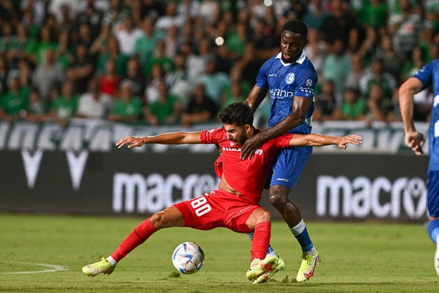 Omonia s Andronikos Kakoullis and Gent s Jordan Torunarigha fight for the ball during a soccer game between Cypriot Omonia Nicosia and Belgian KAA Gent in Nicosia, Cyprus on Thursday 25 August 2022, the return leg of the play-offs for the UEFA Europa League competition. DAVIDxCATRY  x40934491x