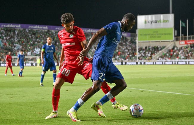 Omonia s Andronikos Kakoullis and Gent s Jordan Torunarigha fight for the ball during a soccer game between Cypriot Omonia Nicosia and Belgian KAA Gent in Nicosia, Cyprus on Thursday 25 August 2022, the return leg of the play-offs for the UEFA Europa League competition. DAVIDxCATRY  x40934542x