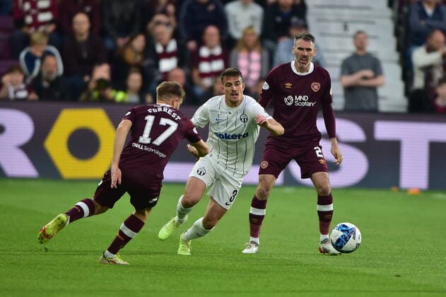 Heart of Midlothian v FC Zürich UEFA Europa League Michael Smith of Heart of Midlothian and Adria Guerrero of FC Zürich during the UEFA Europa League Play-Off Second Leg match at Tynecastle Park, Edinburgh Content Not Available For UK Newspapers Copyright: xJamiexJohnstonx FIL-17264-0040 UK Newspapers OUT