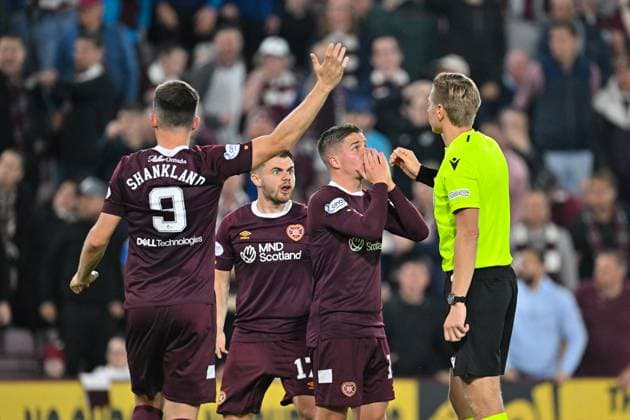 Heart of Midlothian v FC Zurich Europa League 25 08 2022. Play Off Second Leg The Hearts players surround referee Lawrence Visser (BEL) after he send off Hearts Jorge Grant during the Europa League match between Heart of Midlothian and FC Zurich at Tynecastle Park, Edinburgh, Scotland on 25 August 2022. Editorial use only , Copyright: xMalcolmxMackenziex PSI-15818-0009