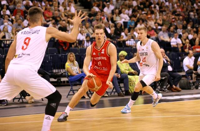 Photo on the ball Justus Hollatz Germany against Ognjen Jaramaz right Basketball Supercup Sat 20 08 2022 4 Nations Cup in Hamburg Germany Serbia