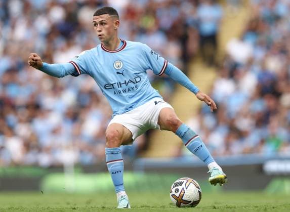 Manchester, England, 27th August 2022. Phil Foden of Manchester City during the Premier League match at the Etihad Stadium, Manchester. Picture credit should read: Darren Staples Sportimage EDITORIAL USE ONLY. No use with unauthorised audio, video, data, fixture lists, club league logos or live services. Online in-match use limited to 120 images, no video emulation. No use in betting, games or single club league player publications. SPI-1820-0031