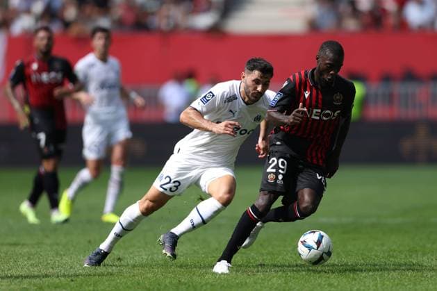Nice, France, 28th August 2022. Nicolas Pepe of OGC Nice is pursued by Sean Kolasinac of Olympique De Marseille during the Uber Eats Ligue 1 match at Allianz Riviera Stadium, Nice. Picture credit should read: Jonathan Moscrop Sportimage EDITORIAL USE ONLY. No use with unauthorised audio, video, data, fixture lists, club league logos or live services. Online in-match use limited to 120 images, no video emulation. No use in betting, games or single club league player publications. SPI-1813-0003