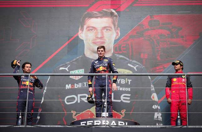 Oracle Red Bull Racing Mexican rider Sergio Perez, Oracle Red Bull Racing Dutch rider Max Verstappen and Scuderia Ferrari Spanish rider Carlos Sainz Jr. celebrate on the podium after winning the F1 Grand Prix of Belgium auto race, in Spa-Francorchamps, Sunday 28 August 2022. The Spa-Francorchamps Formula One Grand Prix takes place this weekend, from August 26th to August 28th. VIRGINIExLEFOUR  x41397268x