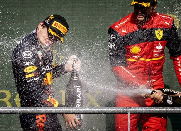 SPA Max Verstappen celebrates his victory with Carlos Sainz R on the podium after the F1 Grand Prix of Belgium at the Circuit de Spa Francorchamps on August 29, 2022 in SPA, Belgium ANP SEM VAN DER WAL F1 Grand Prix of Belgium 2022 xVIxANPxSportx xxANPxIVx 453633292 originalFilename: 453633292.jpg