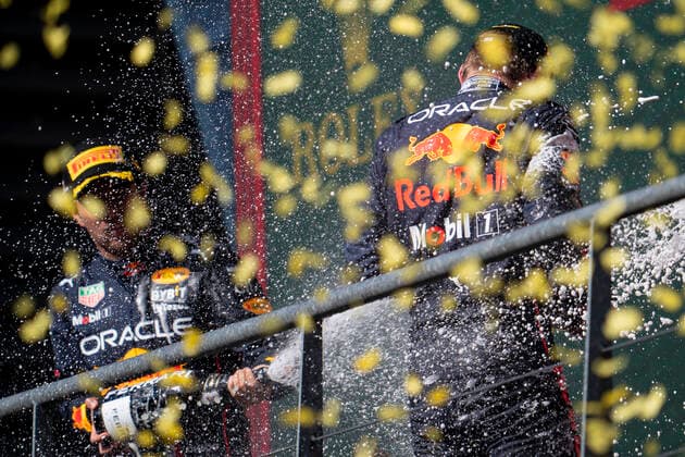 August 28, 2022, Francorchamps, Belgium: (Left to Right) SERGIO PEREZ of Mexico and Red Bull Racing and MAX VERSTAPPEN of the Netherlands and Red Bull Racing on the podium after the 2022 FIA Formula 1 Belgian Grand Prix at Circuit de Spa-Francorchamps in Francorchamps, Belgium. Francorchamps Belgium - ZUMAg147 20220828_zap_g147_011 Copyright: xJamesxGasperottix