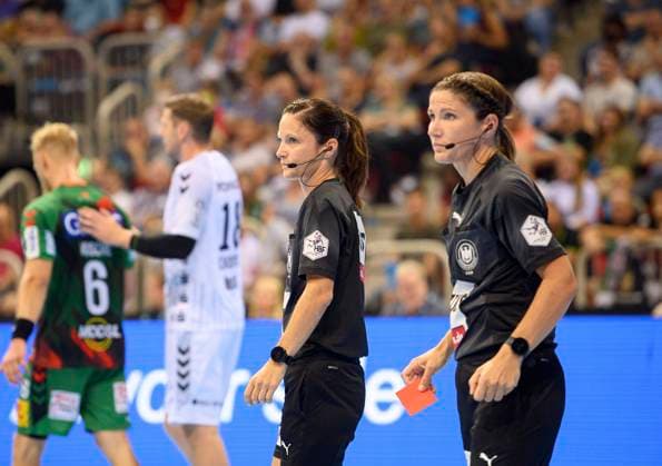 Referee Maike MERZ l and her sister Tanja KUTTLER, with red card in hand, referee, referee Handball Super Cup 2022, SC Magdeburg MD THW Kiel KI 33 36, on 31 08 2022 in Duesseldorf Germany Â