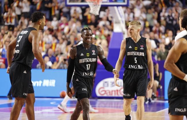 Johannes Thiemann, Dennis Schröder, Niels Giffey Germany vs France European Basketball Championship 2022 , preliminary round in Cologne
