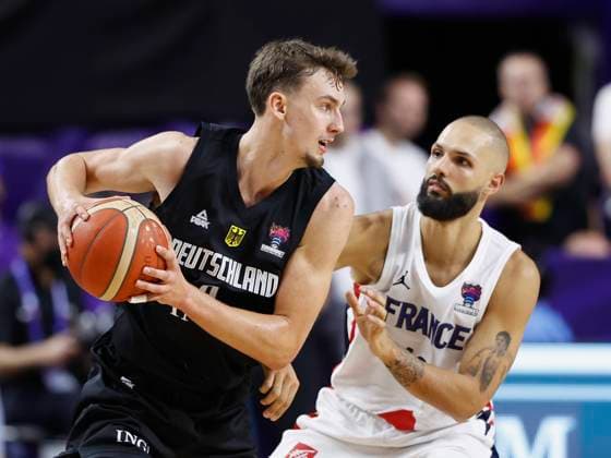 01 09 2022, France vs Germany, FIBA EuroBasket 2022, Germany, Koeln, Lanxess Arena, In picture from left Franz Wagner GER, 9 and Evan Fournier FRA, 10 Copyright: HMBxMedia xHeikoxBecker