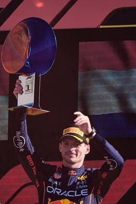 (220912) -- MONZA, Sept. 12, 2022 -- Max Verstappen of Red Bull celebrates victory on the podium after the Italian Formula One Grand Prix at Monza Circuit, Italy, Sept. 11, 2022. ) (SP)ITALY-MONZA-F1-ITALY GRAND PRIX MengxDingbo 