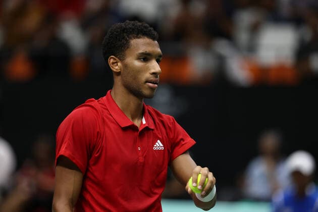 September 13, 2022, VALENCIA, VALENCIA, SPAIN: Felix Auger-Aliassime of Canada in action against Soonwoo Kwon of South Korea during the the Davis Cup by Rakuten 2022, Finals Group B, tennis match 1 played between South Korea and Canada at Fuente de San Luis pavilion on September 13, 2022, in Valencia, Spain. VALENCIA SPAIN - ZUMAa181 20220913_zaa_a181_073 Copyright: xOscarxJ.xBarrosox
