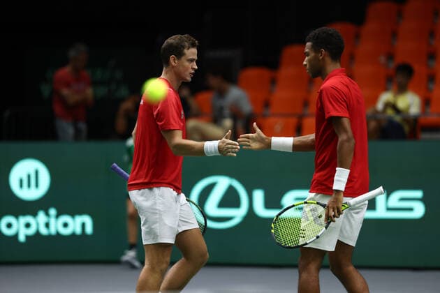 September 13, 2022, VALENCIA, VALENCIA, SPAIN: Felix Auger-Aliassime and Vasekof Pospisil Canada play doubles against Ji Sung Nam and Min-Kyu Song of South Korea during the the Davis Cup by Rakuten 2022, Finals Group B, tennis match 3 played between South Korea and Canada at Fuente de San Luis pavilion on September 13, 2022, in Valencia, Spain. VALENCIA SPAIN - ZUMAa181 20220913_zaa_a181_106 Copyright: xOscarxJ.xBarrosox