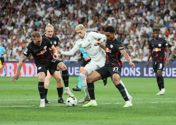 Real Madrid RB Leipzig 14 09 2022 Madrid, 14 09 2022, Estadio Santiago Bernabeu, Football , UEFA Champions League, Group F, Matchday 2 , Real Madrid vs RB Leipzig , Pictured v l David Raum 22, RB Leipzig , Xaver Schlager 24, RB Leipzig , Federico Valverde 15, Real and Abdou Diallo 37, RB Leipzig , UEFA regulations prohibit any use of photographs as image sequences and or quasi video , Picture Point