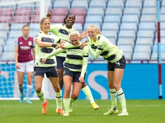 Birmingham, England, 18th September 2022. Laura Coombs of Manchester City (C) celebrates after scoring the third goal during the The FA Women s Super League match at Villa Park, Birmingham. Picture credit should read: Andrew Yates Sportimage EDITORIAL USE ONLY. No use with unauthorised audio, video, data, fixture lists, club league logos or live services. Online in-match use limited to 120 images, no video emulation. No use in betting, games or single club league player publications. SPI-1888-0011